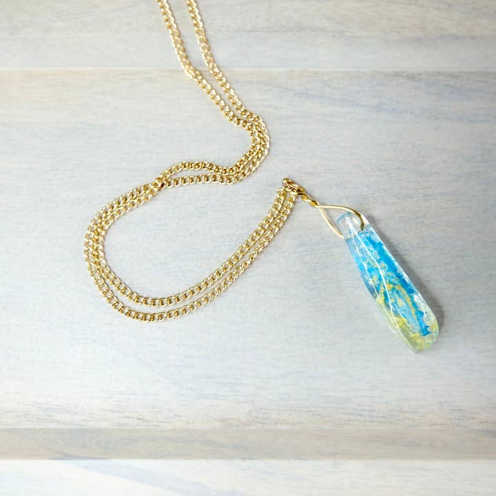 BlueButterflyBazaar – Großhandel Kette mit Anhänger/Charm – Reylo kleiner Anhänger Kyber Kristall Halskette gelb und blau für Rey und Ben Solo Crystal Star Wars Geschenk