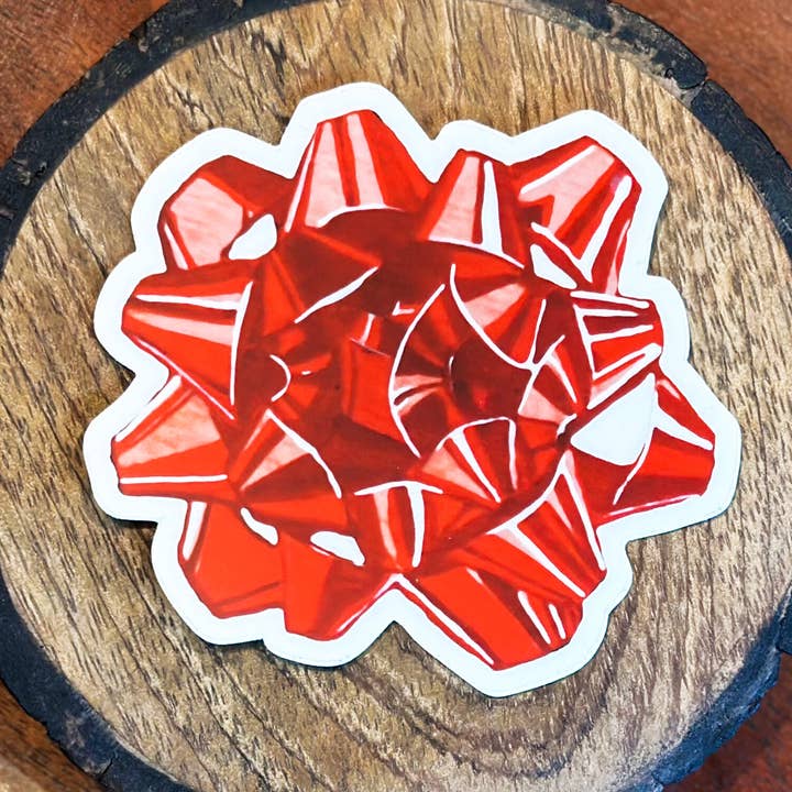 Adesivo in vinile con fiocco rosso trasparente per la vendita all'ingrosso da parte di Drfrankensara Illustration