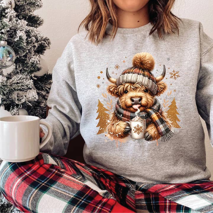 Winter Highland Cow Sweatshirts for wholesale by Clover + Cotton Co