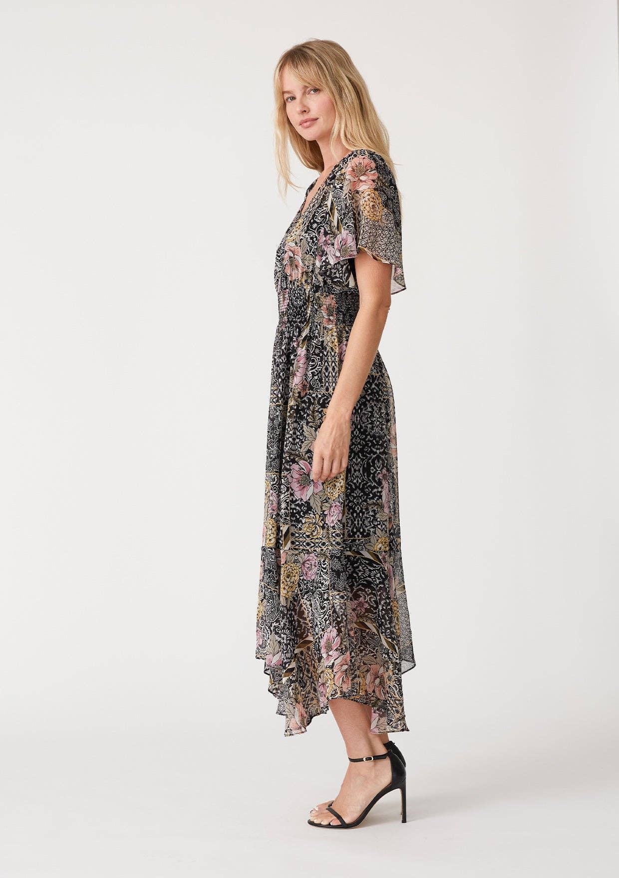 Black Dusty Peach Flowy Asymmetrical V Neck Smocked Maxi Dress for wholesale on Faire2