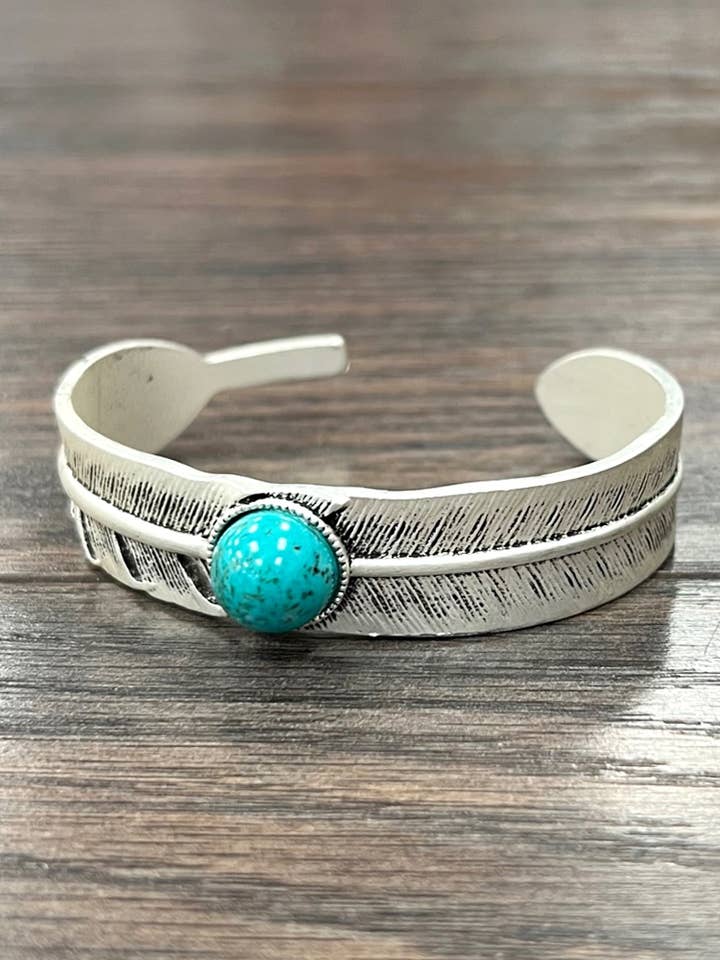 711281, Feather Turquoise Cuff Bracelet for wholesale by ISAC Trading Inc
