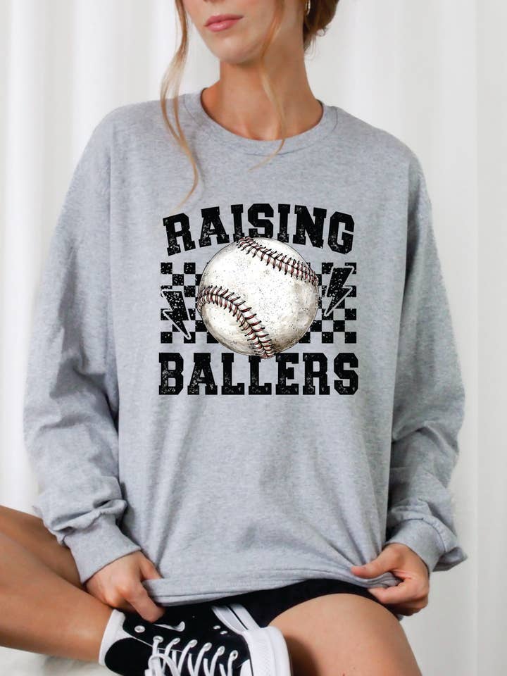 Raising Ballers Graphic Cozy Sweatshirt for wholesale by Ink + Thread