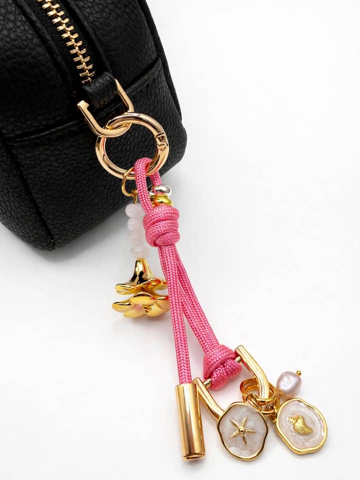 Leo Charm – Bag & Accessory Charm (Dark Pink, Plumeria) for wholesale by Leo & Lei