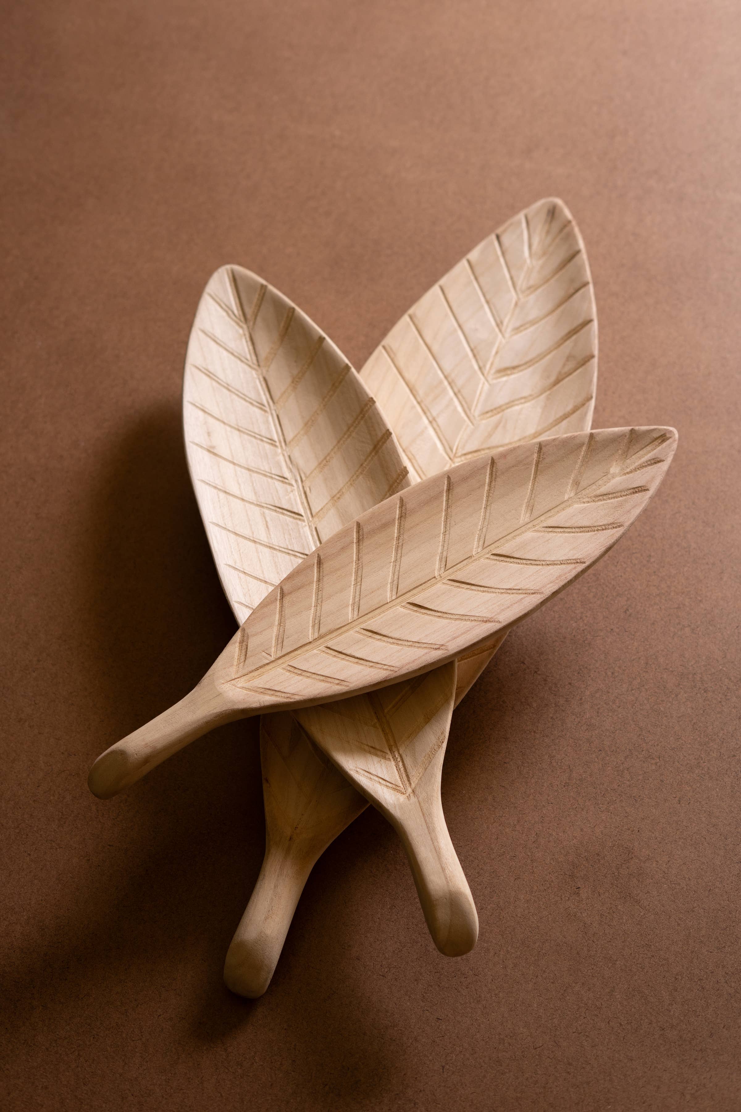 Natural SET OF THREE WOODEN LEAF TRAYS  for wholesale on Faire3