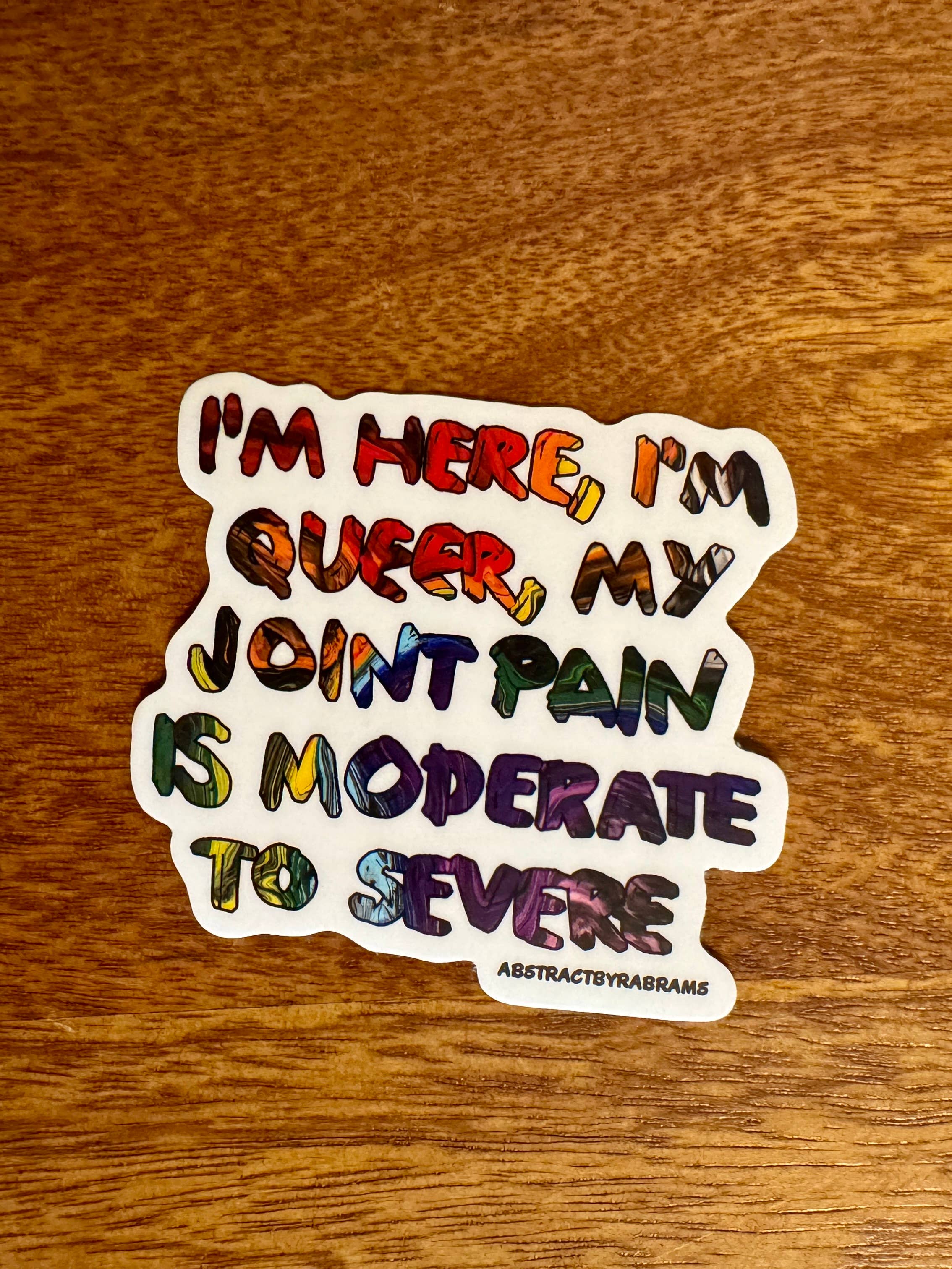 AbstractbyRabrams - Wholesale Sticker - I'm Here I'm Queer Pain is Moderate to Severe Vinyl Sticker1