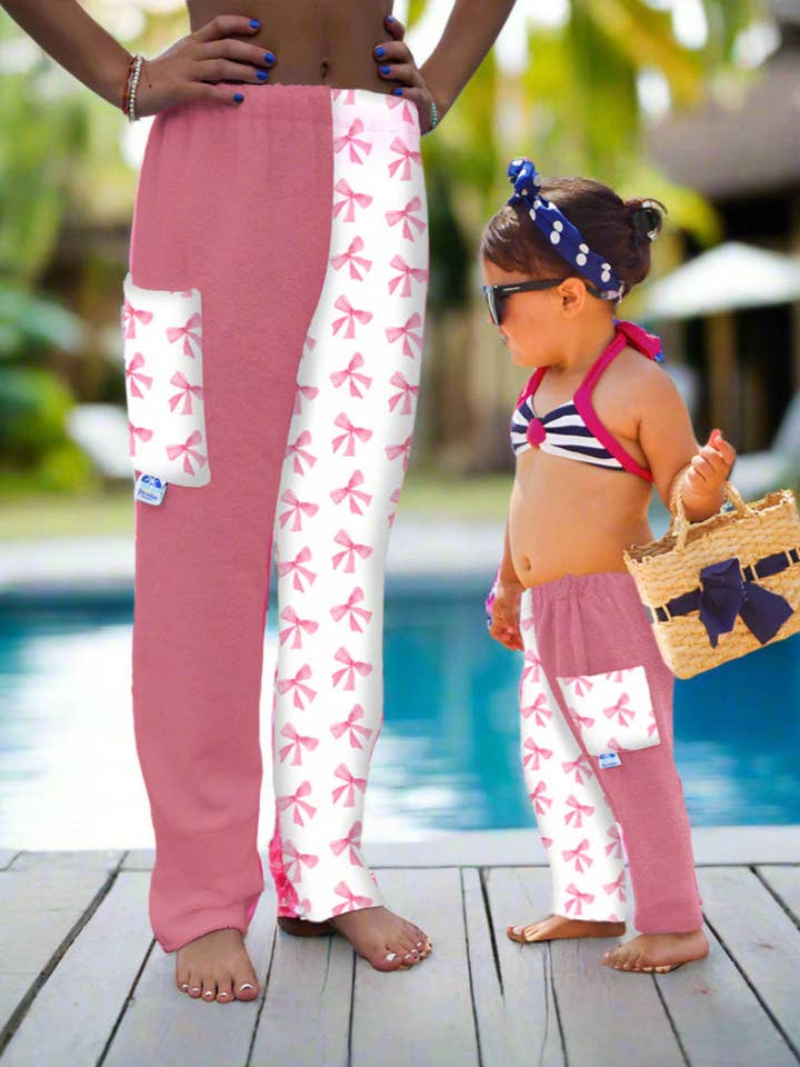 Pantaloni Asciugamano per Nuotatori – DISPONIBILI Spedizione Veloce - Copricostume da Spiaggia – Costume da Bagno - Fiocchi Rosa per la vendita all'ingrosso da parte di Paradise Towelwear