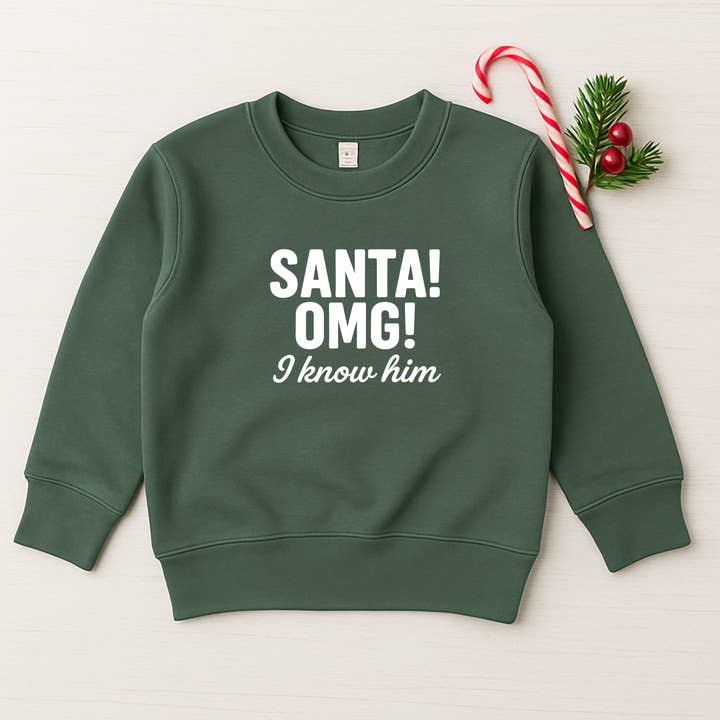 Santa OMG I Know Him! Funny Christmas Sweatshirt for wholesale by The Wishing Elephant