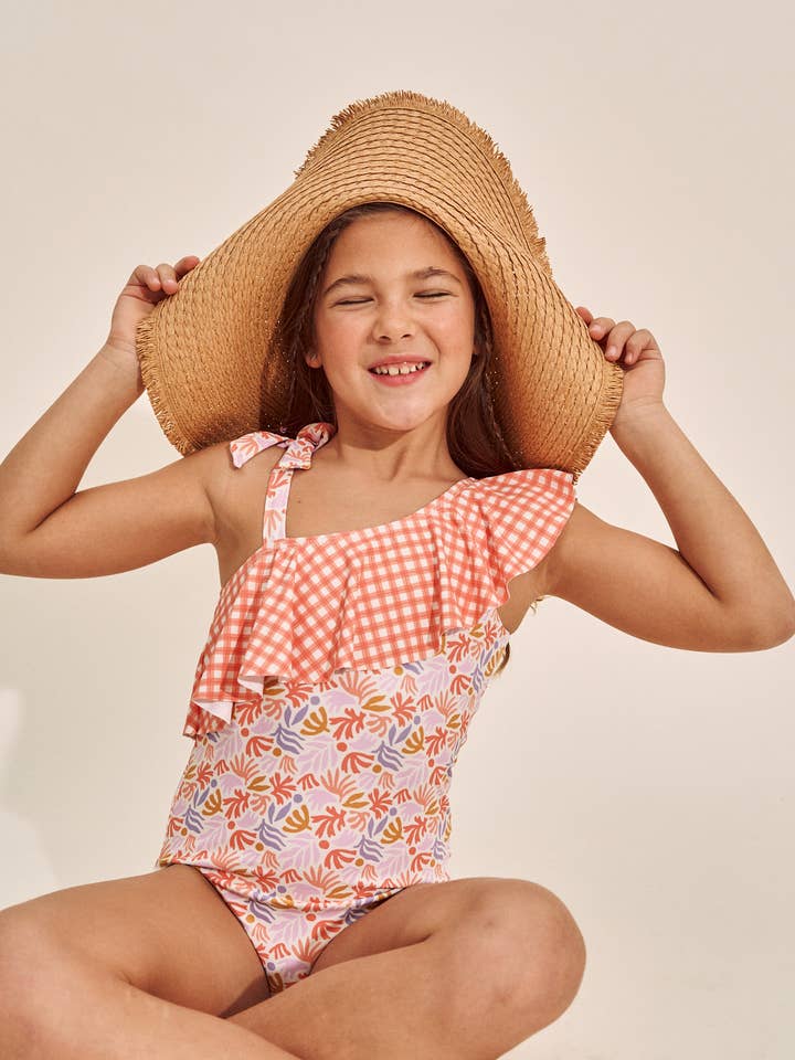 Girl's swimsuit with floral print and orange gingham ruffle for wholesale by Dadati