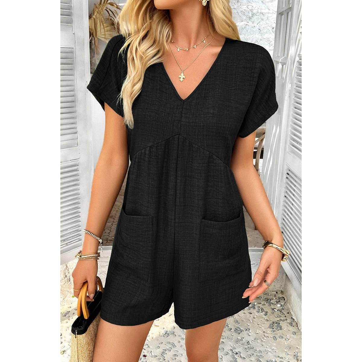Elings – Großhandel Romper – Damen – Solider Tiefer V-Ausschnitt Drop-Shoulder-Loser Jumpsuit mit Taschen5