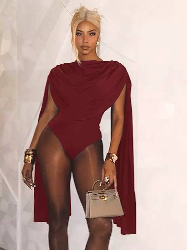 MB FASHION Draped Cape Sleeve Bodysuit 670 and other Purchase Wholesale body suits for women. Free Returns & Net 60 Terms on Faire trending on Faire.