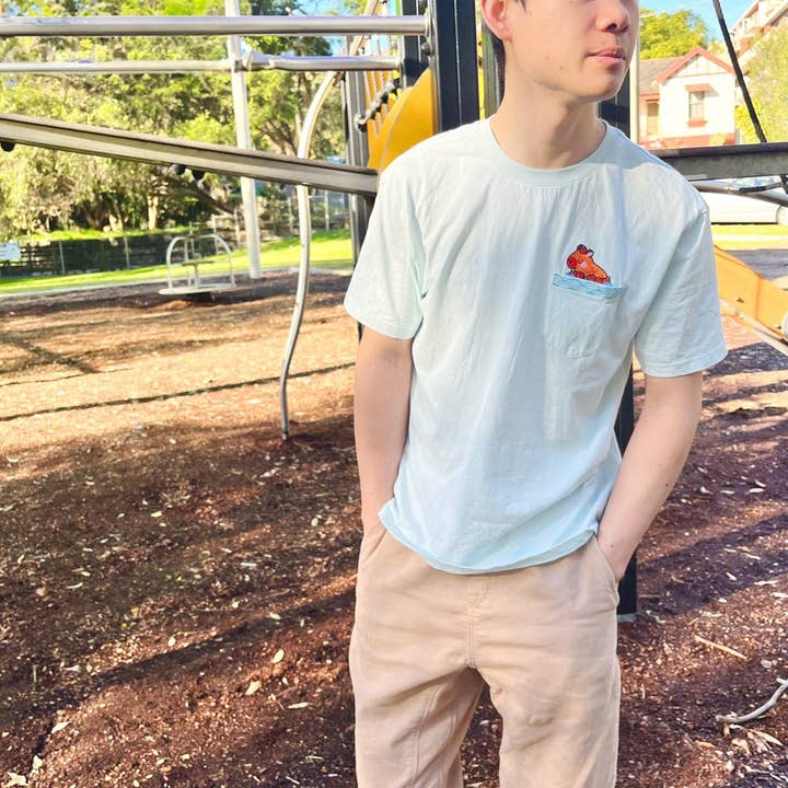 Jessthechen - Wholesale T-Shirt - Unisex - Bathing Capybara Embroidered Pocket Tee | Sky Blue1