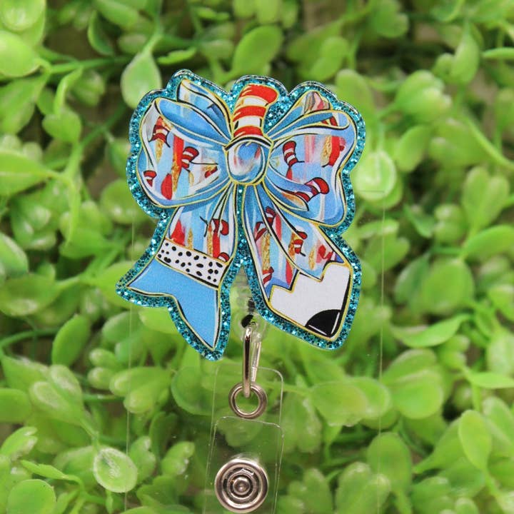 Dr Suess Pencil Bow Badge Reel for wholesale by Hylidae Boutique