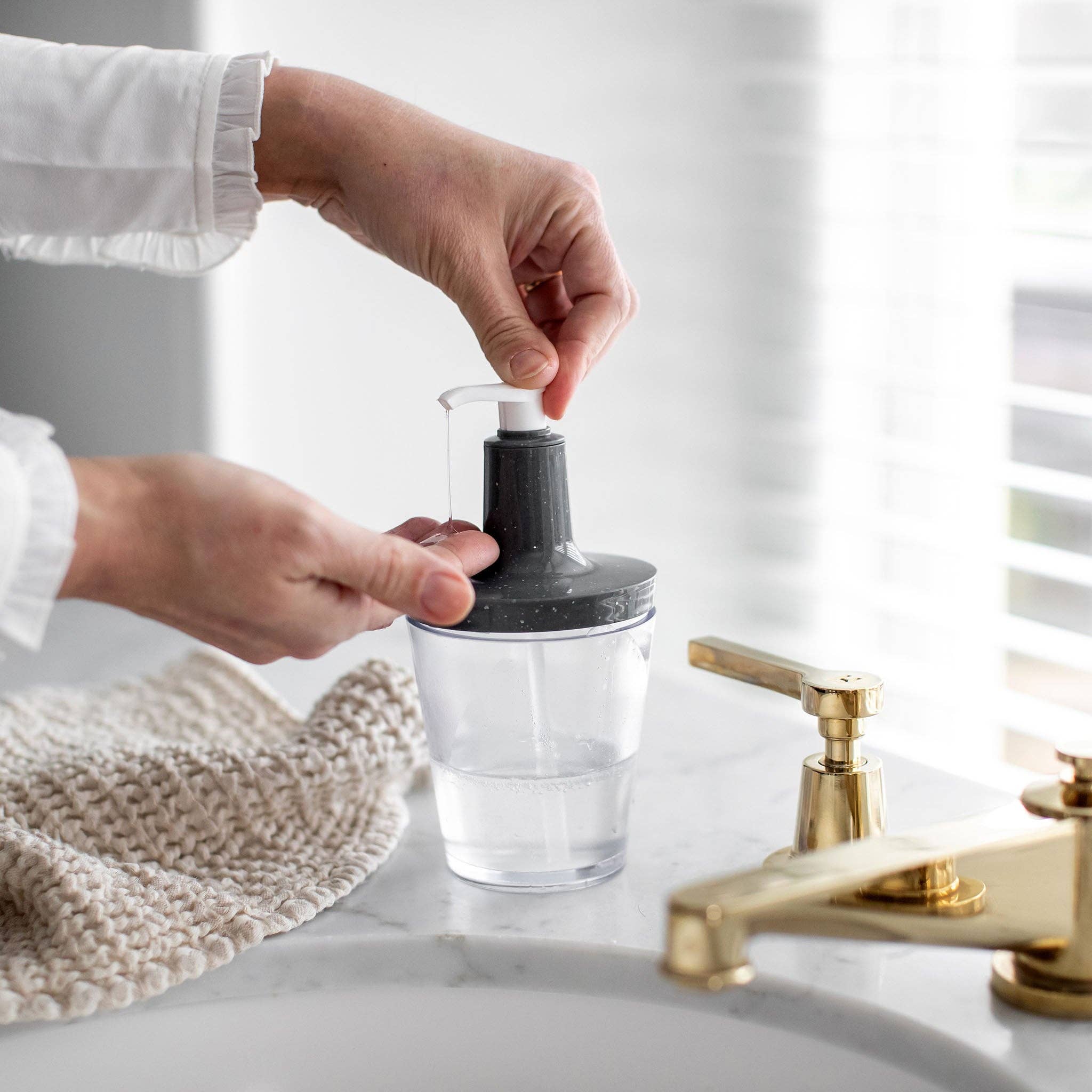 recycled ash grey Soap Dispenser FLOW for wholesale on Faire1