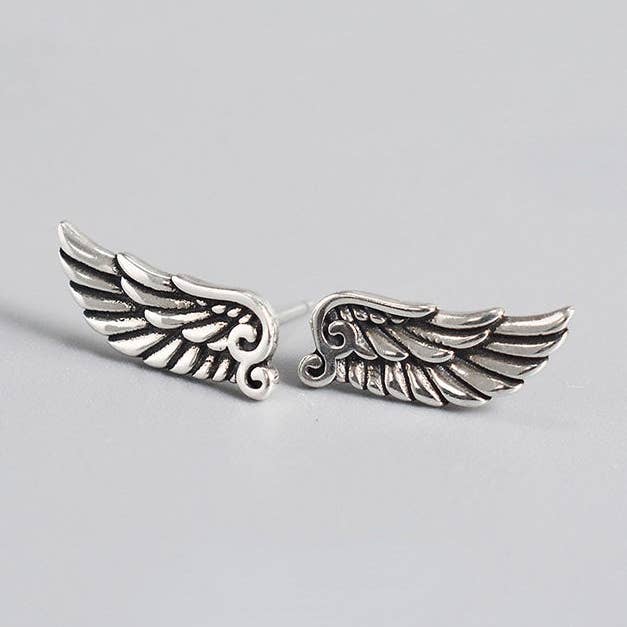 Trendy 925 Silver Wings Ear Studs for wholesale by Tourtiwi