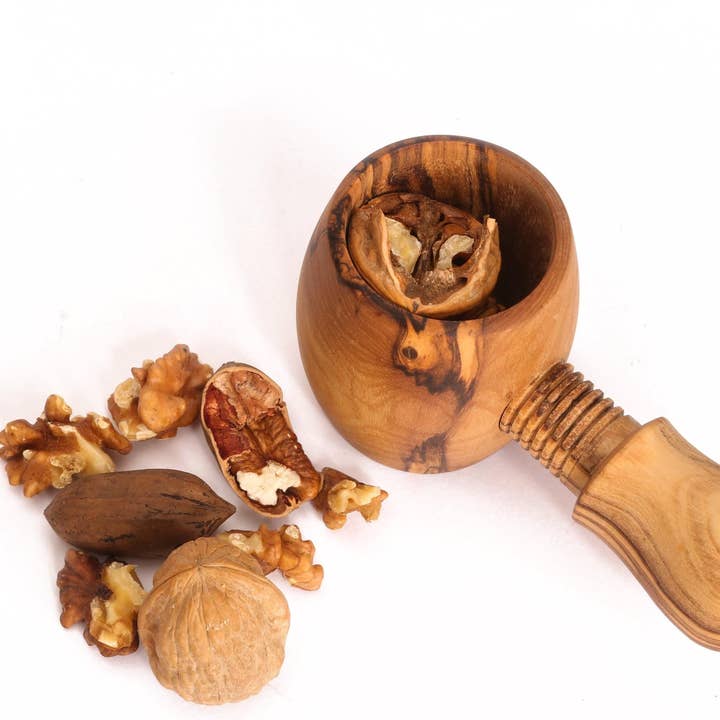 Olive Wood Nut Cracker and other Purchase Wholesale screws and nuts. Free Returns & Net 60 Terms on Faire trending on Faire.