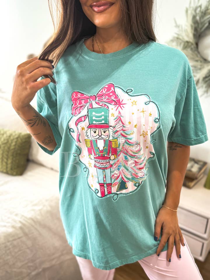 Pink Nutcracker Graphic Tee on Seafoam for wholesale by birdie
