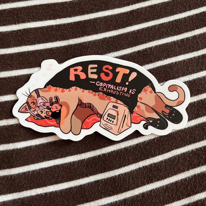 Rest! Capitalism is Exhausting - CPAP Cat Sticker (Glossy) for wholesale by Liberal Jane Illustration