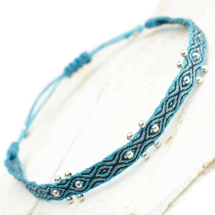 Sol silverarmband, handgjort med 80 färgade trådar för wholesale av Gota de Agua