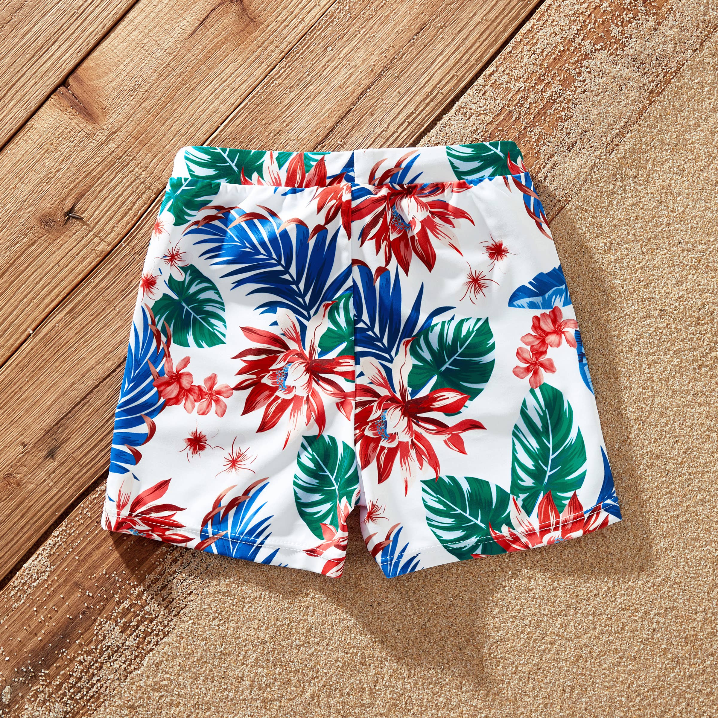 Red Matching Family Tropical Plant One-piece Swimsuit or trunks for wholesale on Faire14