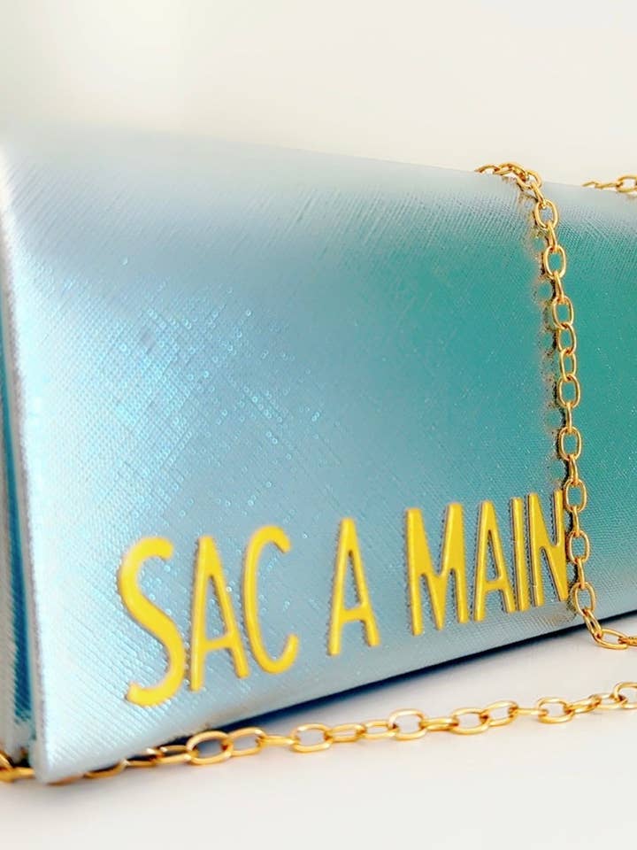 Metallic Blue Clutch for wholesale by Soderena Designs