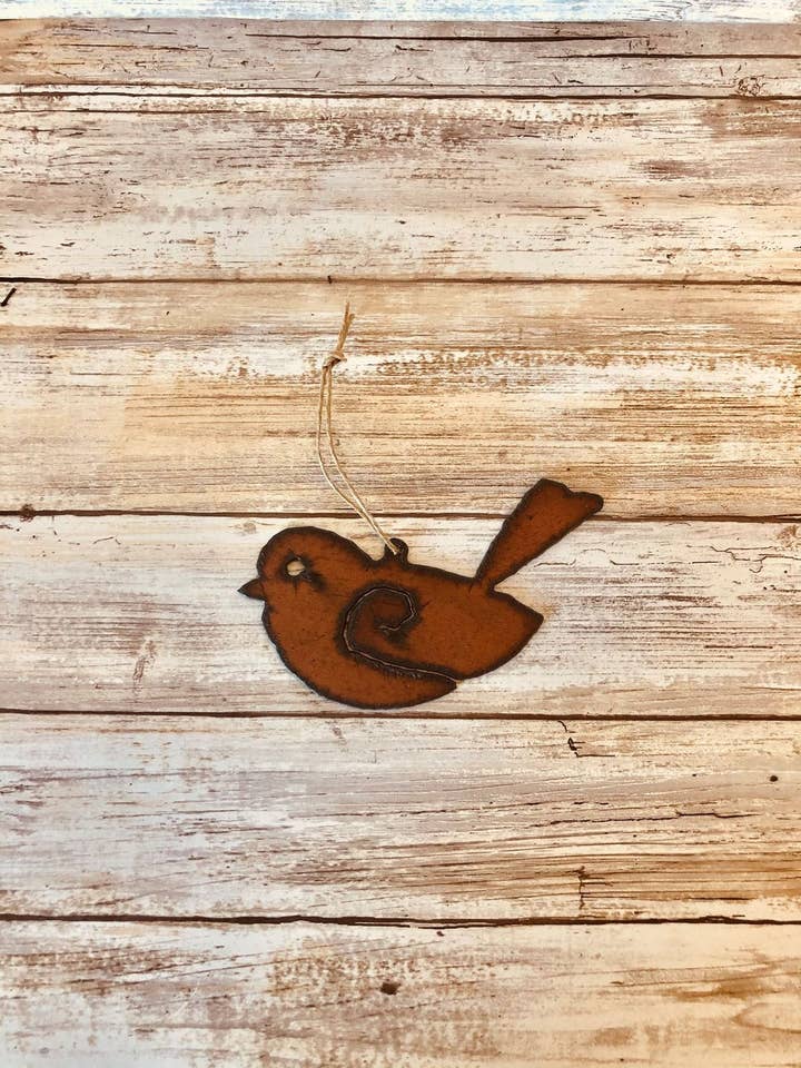 Bird With Swirl Ornament for wholesale by Universal Ironworks USA