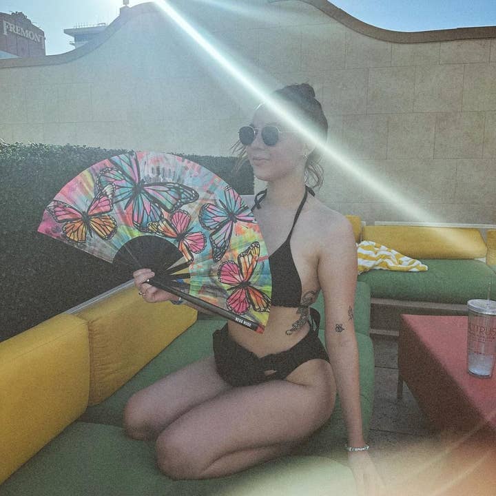 MULTI Flutter By Butterfly Super Blacklight Reactive Folding Fan for wholesale on Faire4