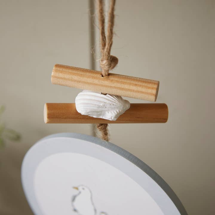 Blue Plaque - Round Driftwood/Shells Coastal Birds for wholesale on Faire