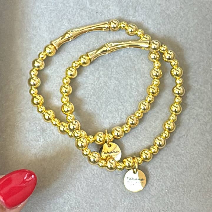 Bracelet extensible en perles dorées pour la vente par Tahana Designs