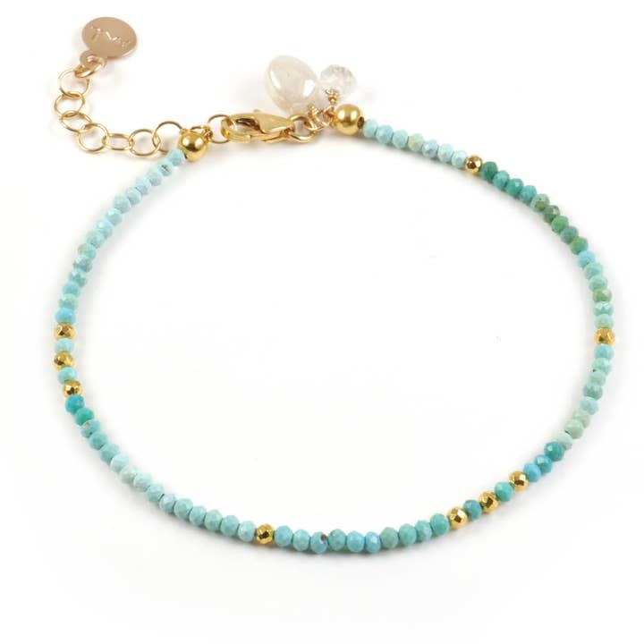Turquoise Charm Bracelet and other Purchase Wholesale pop it bracelet. Free Returns & Net 60 Terms on Faire trending on Faire.