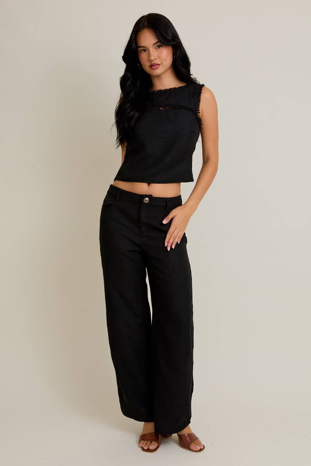 Black SLEEVELESS BOAT NECK FRONT CUT OUT TOP WITH WIDE LEG PANTS for wholesale on Faire