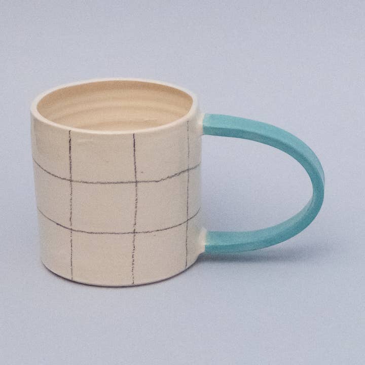 Squared cup with blue handle for wholesale by Odeon Studio