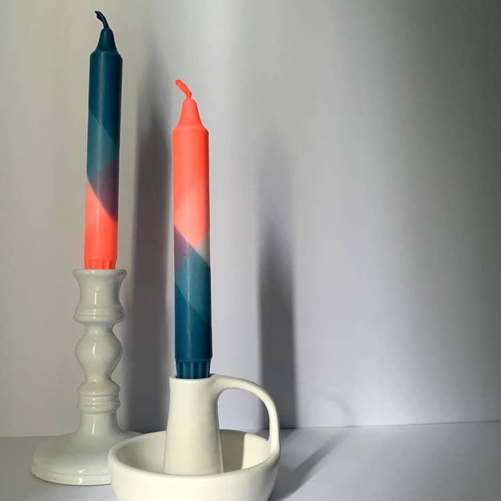Neon Coral and Teal Dip Dyed Dinner Candles for wholesale by The Singing Rabbit