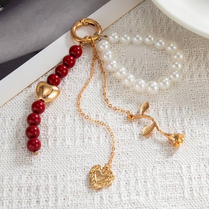 Ornaments-heart-shaped tassel mitation pearl beaded keychain for wholesale by Eagle Crest Industries Inc.