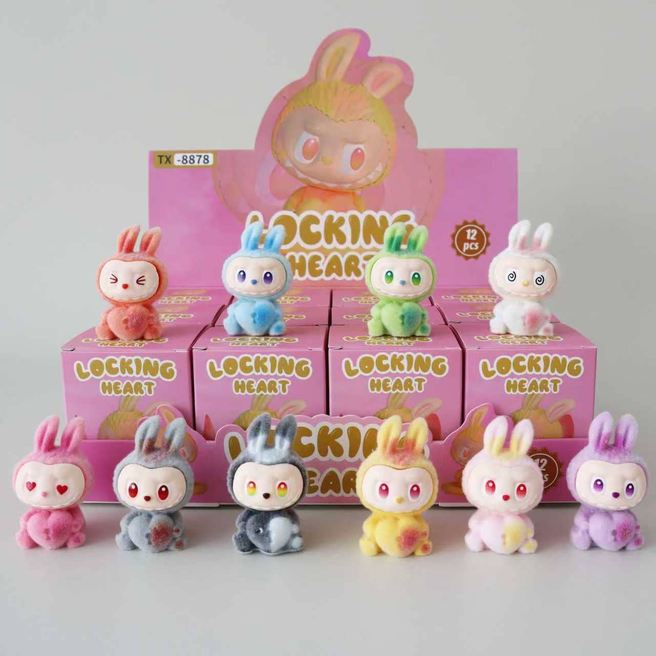 Auraquise - Vente Figurine – enfant - Jouet de collection en vinyle floqué de Noël Boîte surprise1