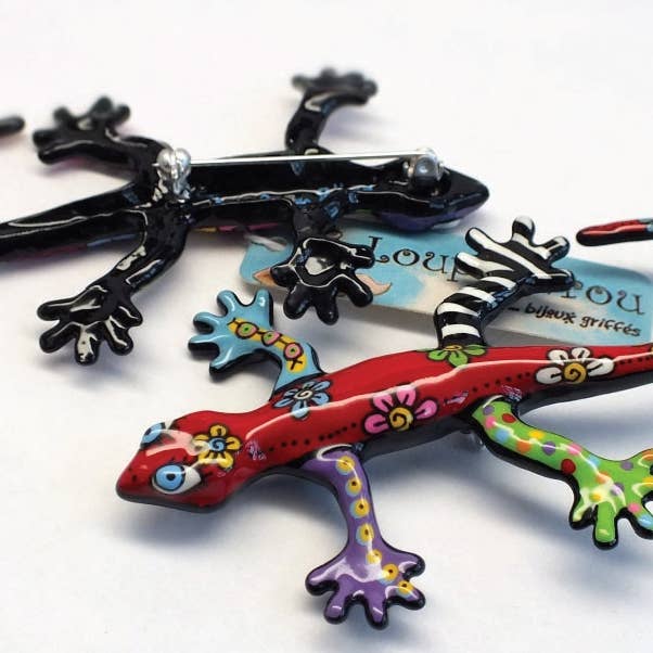 Spilla «Dita di lucertola spiegate di rosso con fiori» per la vendita all'ingrosso da parte di LOUP GAROU BIJOUX