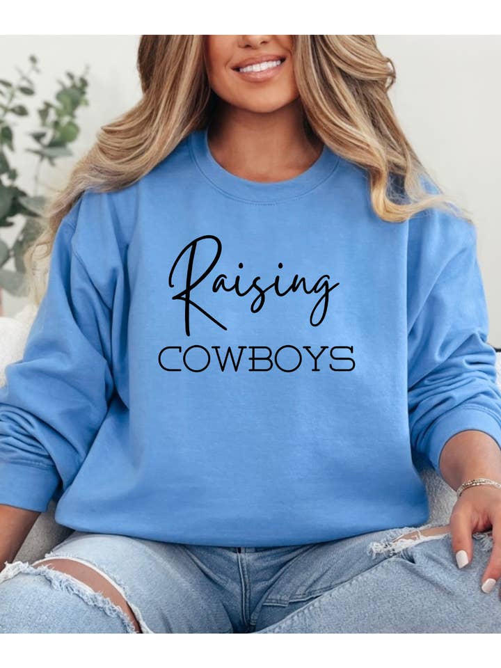 Raising Cowboys Graphic Sweatshirt for wholesale by Rock n' Rodeo