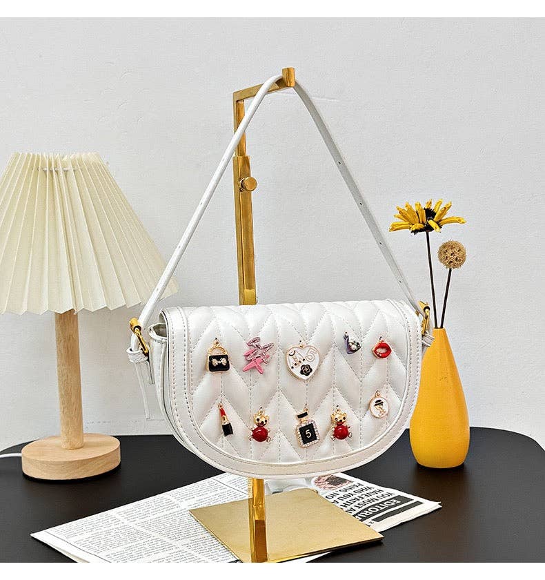 MB Fashion Wholesale - Wholesale Crossbody Bag - Women's - Every Fashion Charm Saddle Crossbody Bag – Quilted PU Leather with Cute Charms 27712