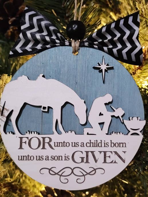 Forgiven Cowboy at Manger Ornament for wholesale by Heartland Decor