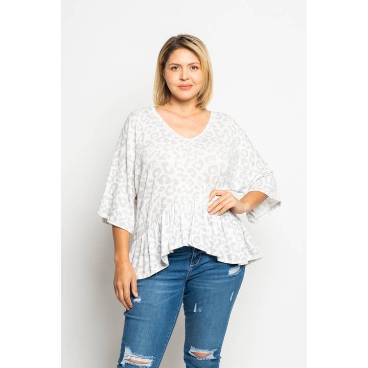 PLUS SIZE LEOPARD PEPLUM TOP for wholesale by Curve Market