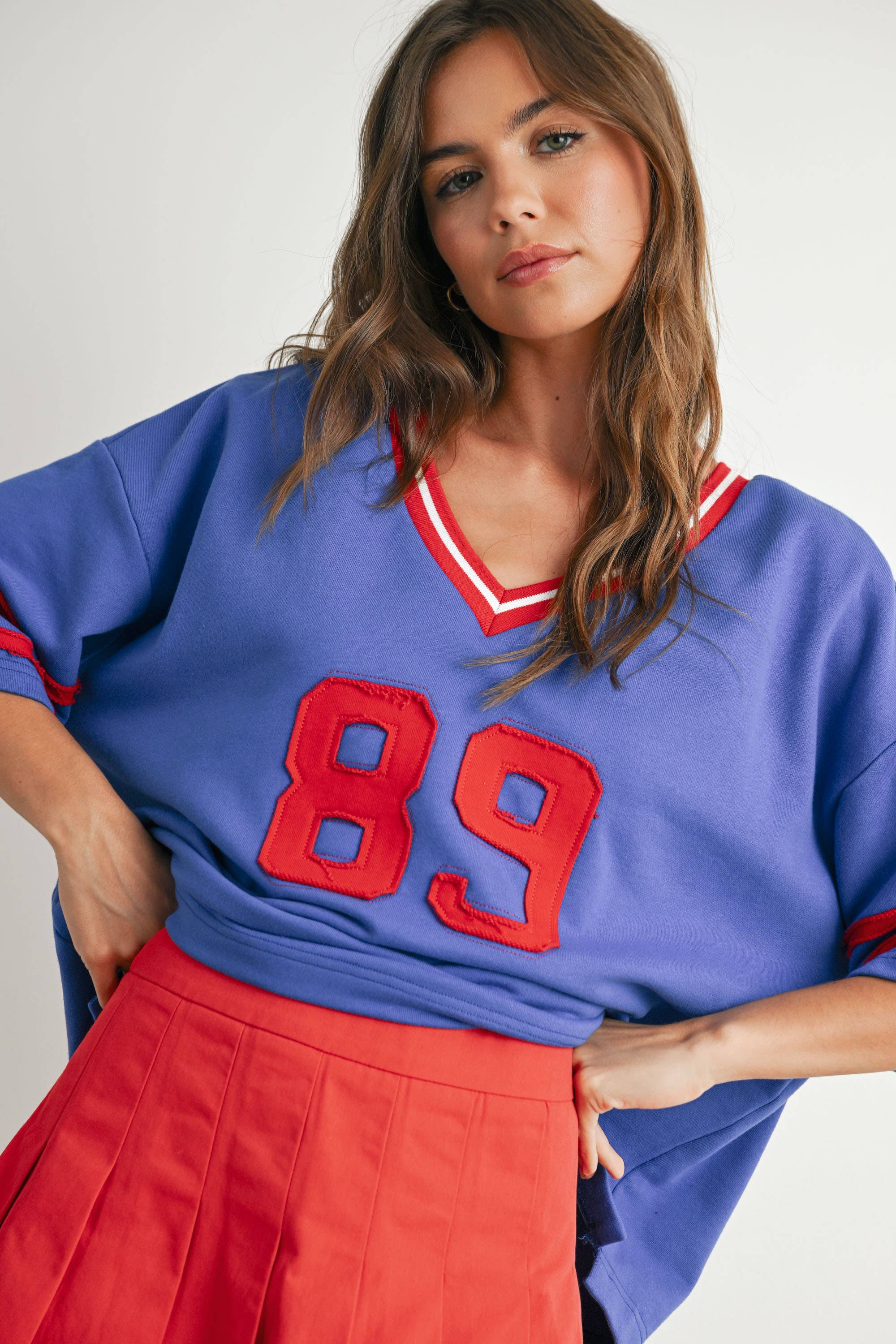 BUTTERMELON - Vendita all'ingrosso Maglietta - Donna - Maglia oversize sporty Varsity Spirit - BMT773417