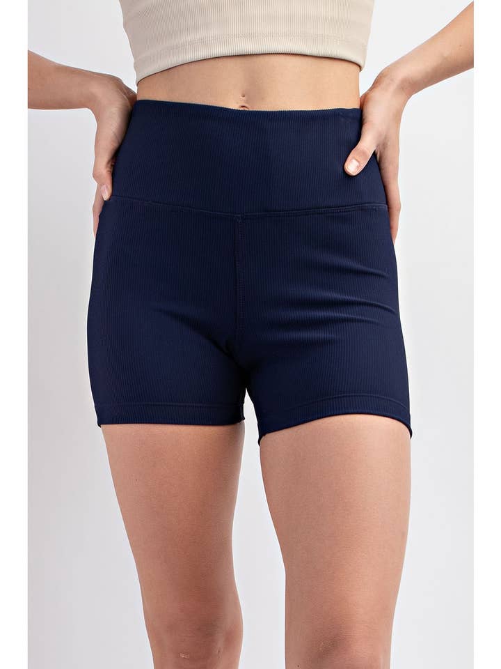 PANTALON DE MOTARD CÔTELÉ EN NYLON AVEC POCHES LATÉRALES pour la vente par Rae Mode