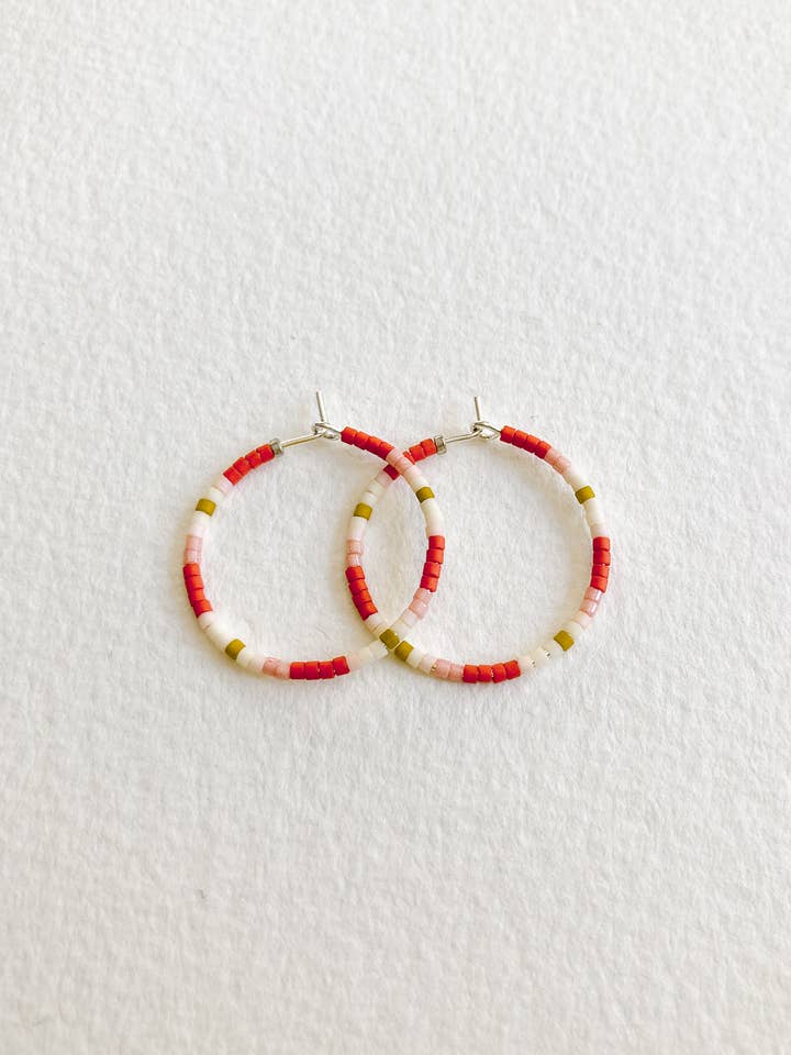 70's orange petite hoops for wholesale by Jules + Leo