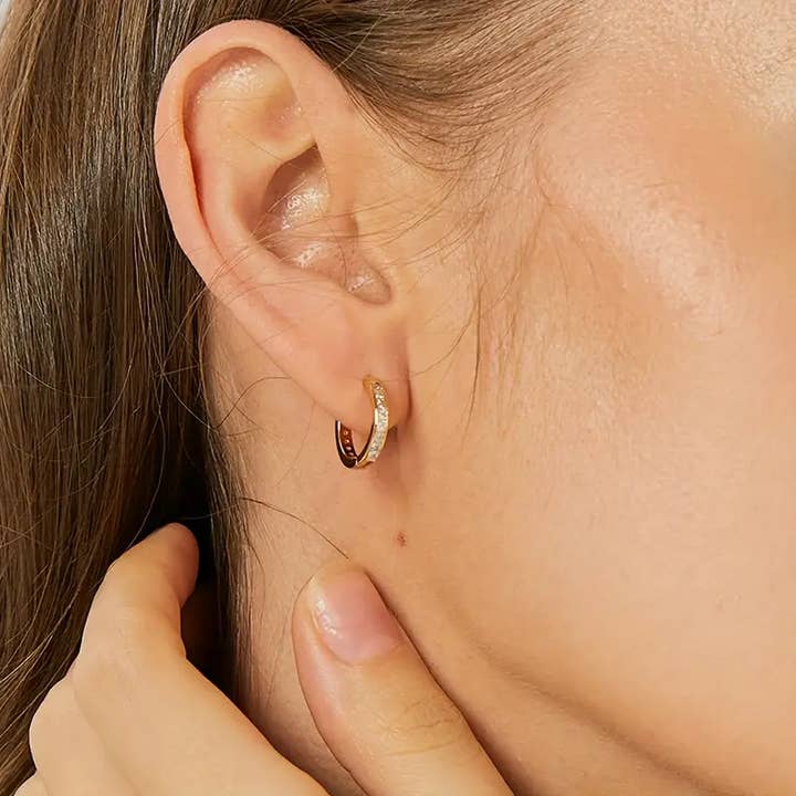 Gold Huggies 14K Gold Plated Cubic Zirconia Hoop Earrings for wholesale by Arniyara