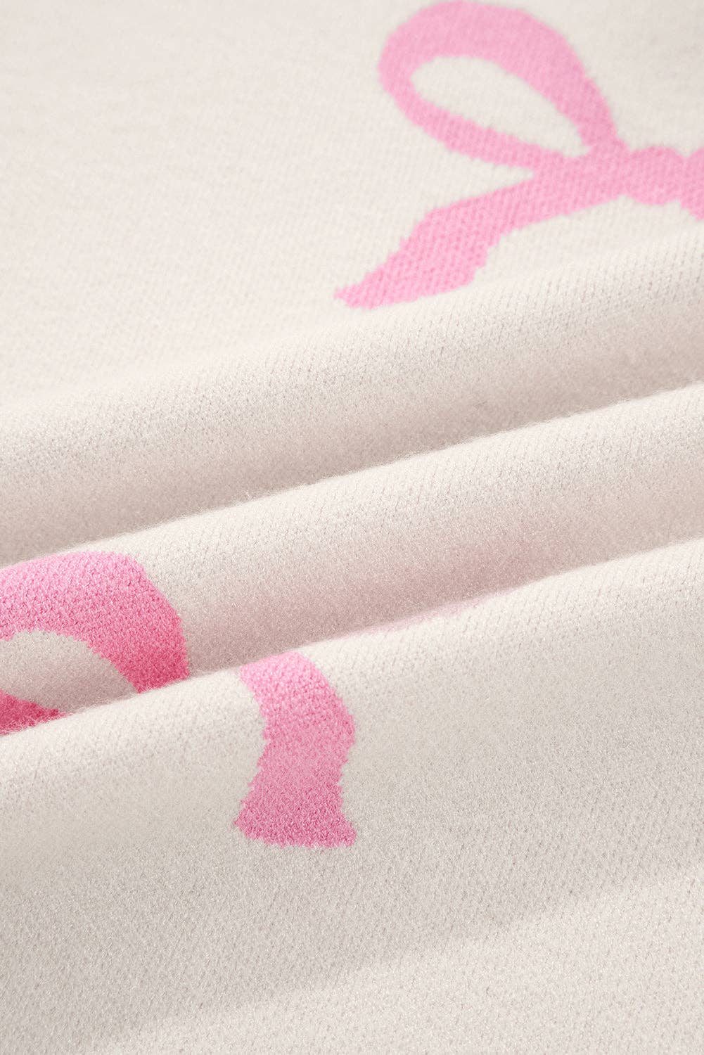 Pink Bow Ribbed Trim Reverse Seam Drop Shoulder Sweater for wholesale on Faire5