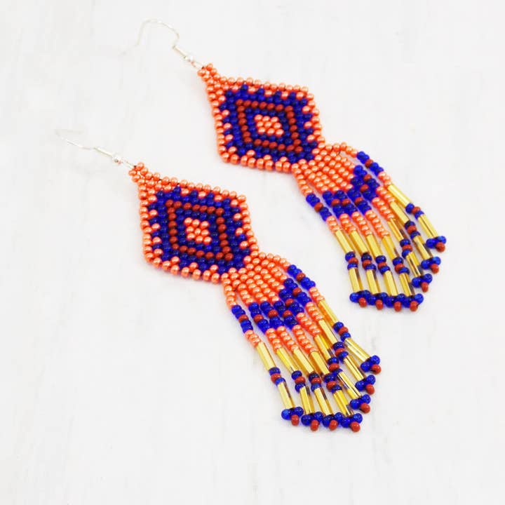 Orecchino stile nativo con frange di perline di semi Orecchini autunnali autunnali Orecchini culturali con perline nativi Gioielli occidentali festivi bohémien Geometrici per la vendita all'ingrosso da parte di Ninolia