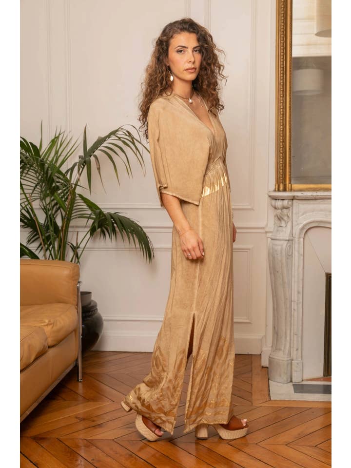 golden Maxi dress printed with gold, neckline and a tie at the back for wholesale on Faire3
