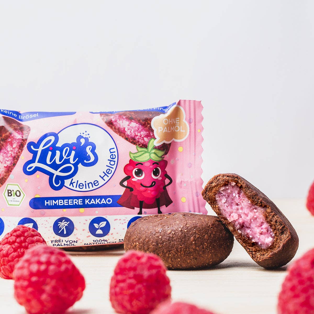 Livi's – Engroshandel Chokoladeovertrukket slik – Økologiske dadelkugler med hindbær, kokos og kakao1