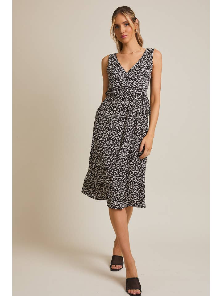 BLACK IVORY SLEEVELESS FAUX WRAP SIDE TIE MIDI DRESS for wholesale on Faire