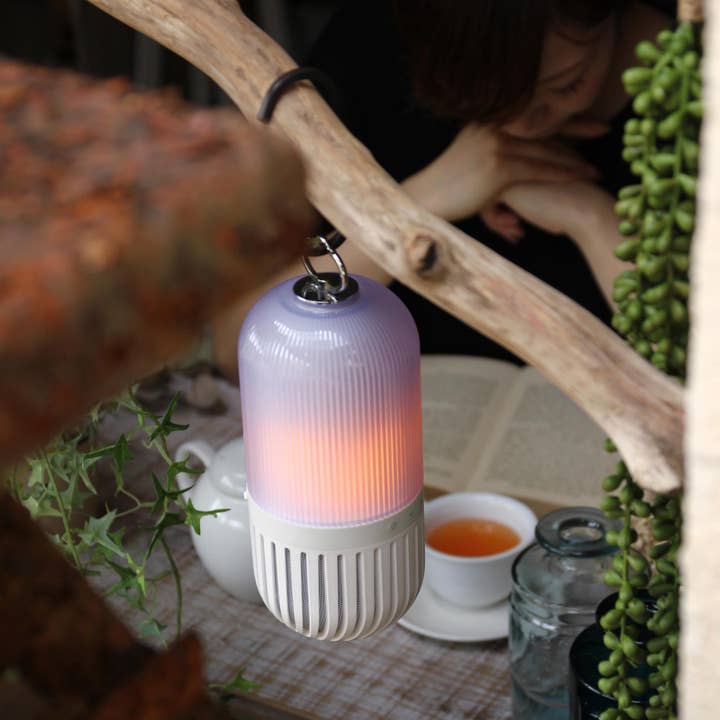 White Bonfire Bluetooth Speaker: Rechargeable & Waterproof for wholesale on Faire