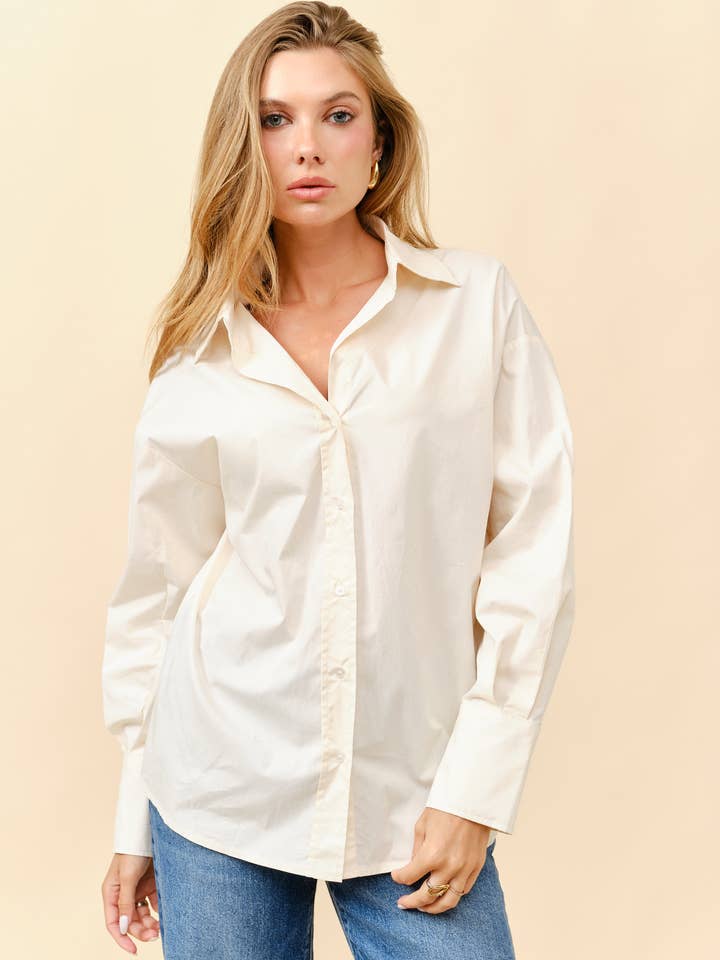 Top versatile con bottoni oversize per la vendita all'ingrosso da parte di Tea & Cup